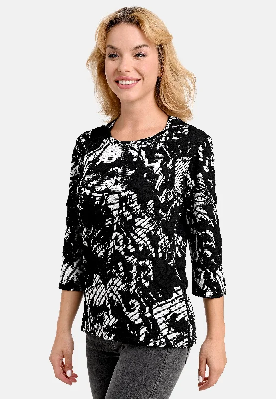 women's tops for those who want to stay on top of the latest fashion trends and wear pieces that are both stylish and on-trendFine Line Print Top