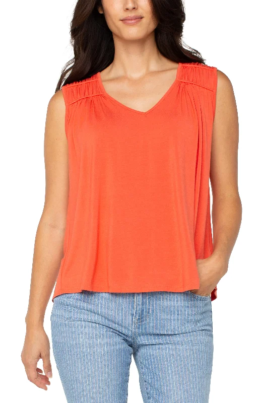 women's tops for those who want to add a pop of color to their outfitsSLEEVELESS SHIRRED DETAIL KNIT TOP