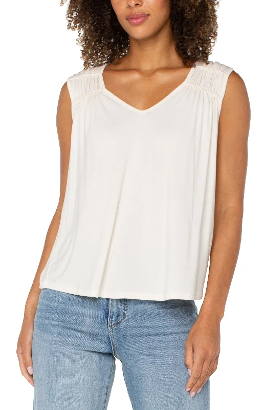 women's tops for those who want to add a touch of sophistication to their casual attireSLEEVELESS SHIRRED DETAIL KNIT TOP